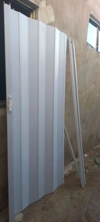 Vendo porta sanfonada  nova branca 2.10x94