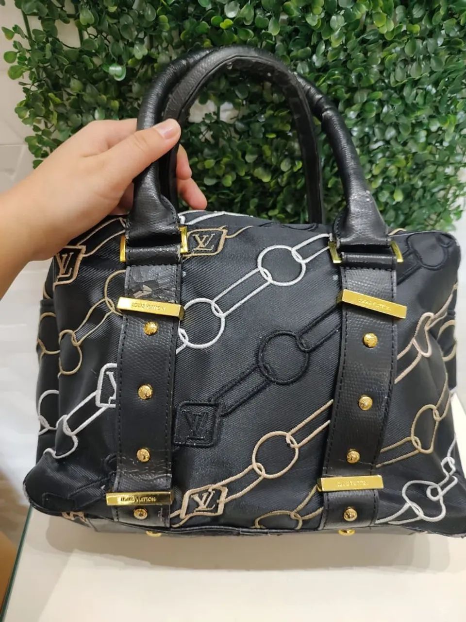 Bolsa de mão preta e dourada Louis Vitton  - Foto 4