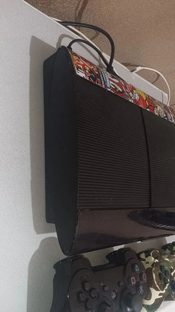 Ps3 desblo, com marcas de uso porém funcionando - Foto 3