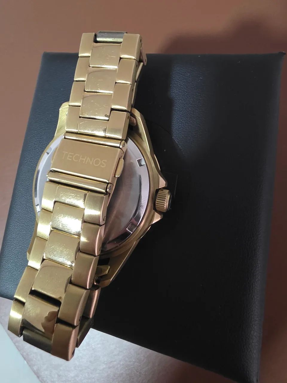 Relógio technos dourado  - Foto 4
