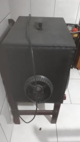Caixa de som toca na luz 400 reais