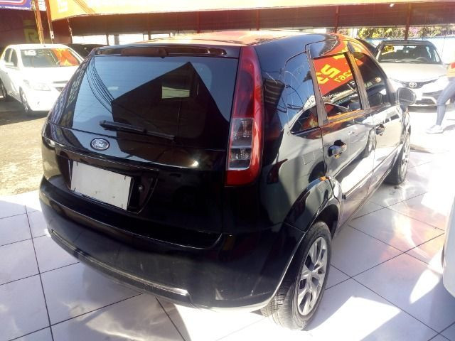 Ford Fiesta Hatch compl + Gnv + 48 X 390,00 Primeira parcela por conta da loja - Foto 4