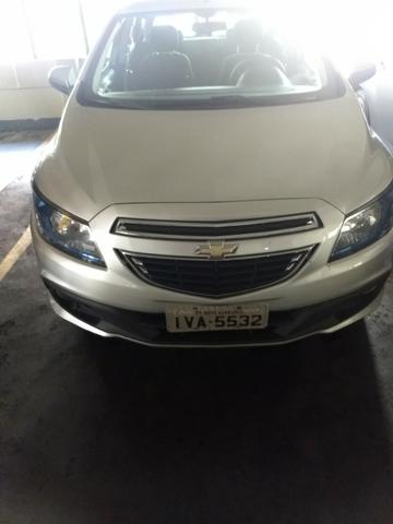 Chevrolet onix em perfeito estado, 4 pneus novos, único dono, nunca foi batido pago - Foto 5