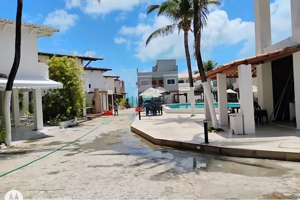 "Casa de Luxo na Praia: Conforto e Sofisticação" - Foto 3