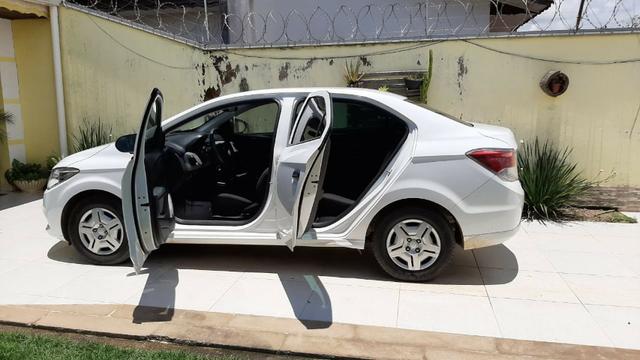 Prisma Joy 1.0 seminovo Branco Impecável carro de mulher - Foto 4