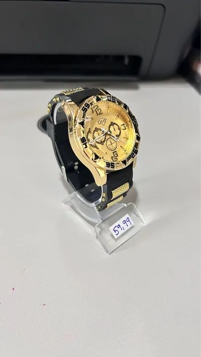 Relógio dourado com pulseira preta - Foto 3