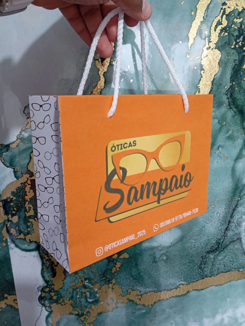 Sacolas personalizada óticas Sampaio ?