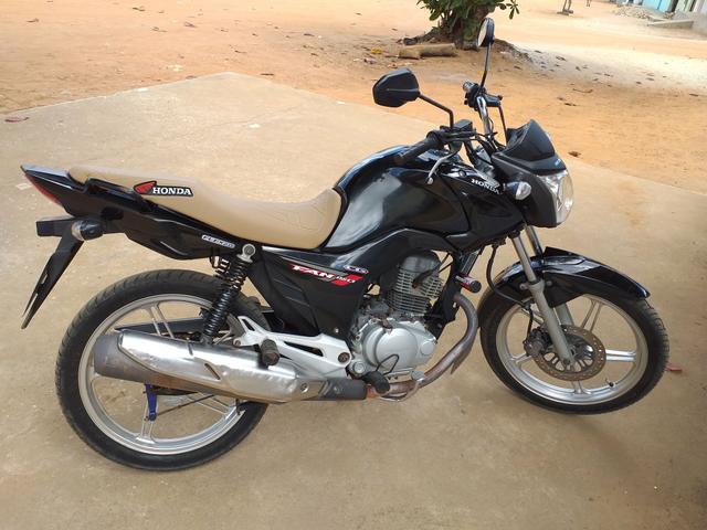 Vendo ou troco moto todo perfeita fan 150