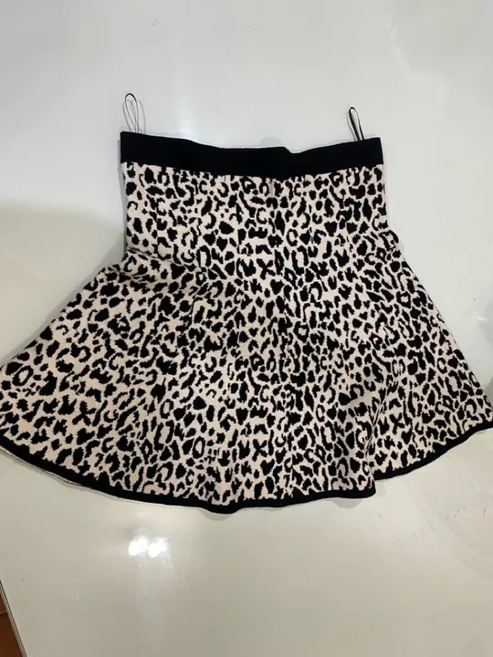 Saia de onça preto e branco M