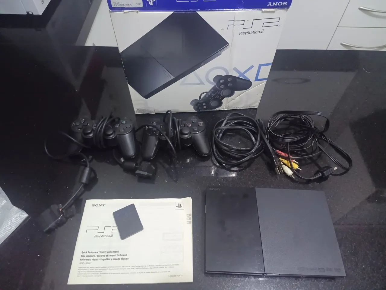 Playstation 2 com 2 controles e jogos