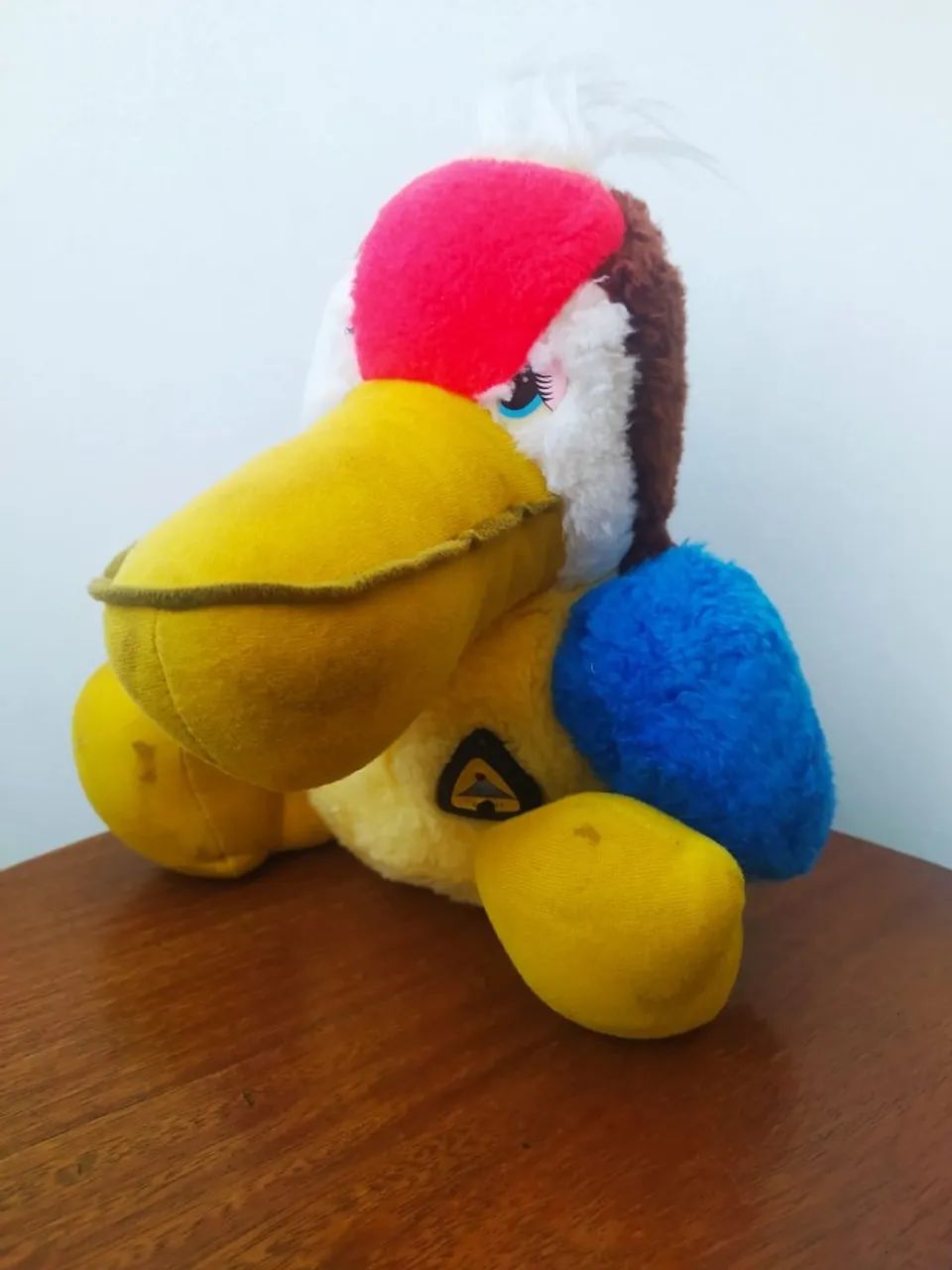 Pelúcia Pássaro Colorido