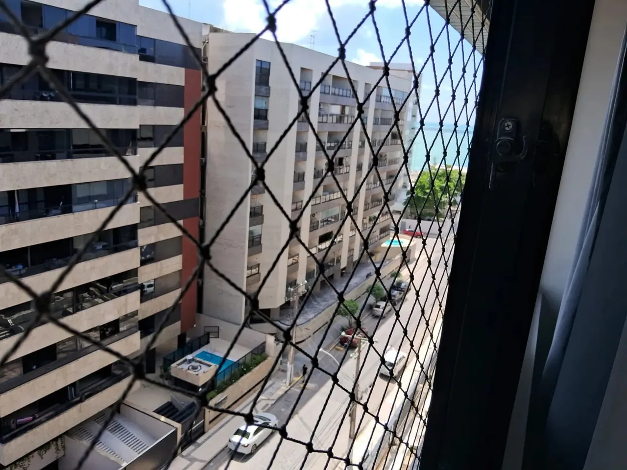 Quarto e sala com vista mar
