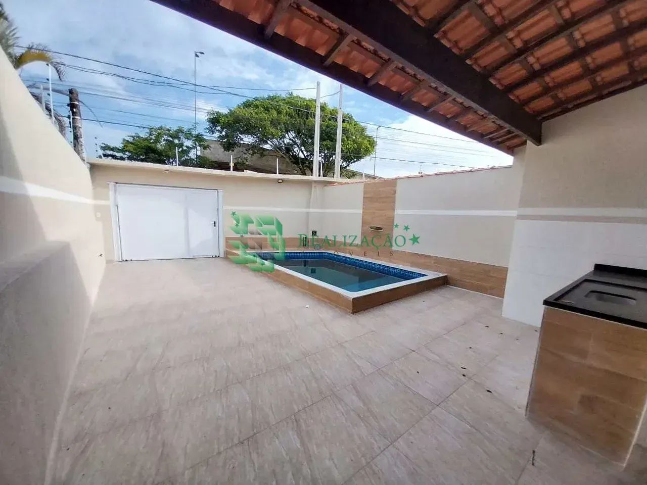 CASA COM PISCINA EM MONGAGUÁ - Foto 2