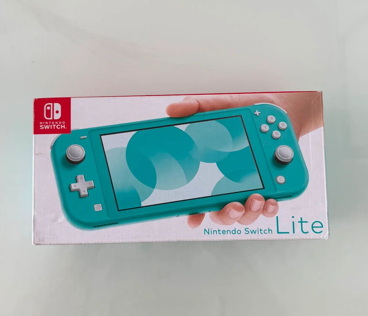 Nintendo Switch Lite Turquesa+ Caixa Original + Case+ 1 jogo de