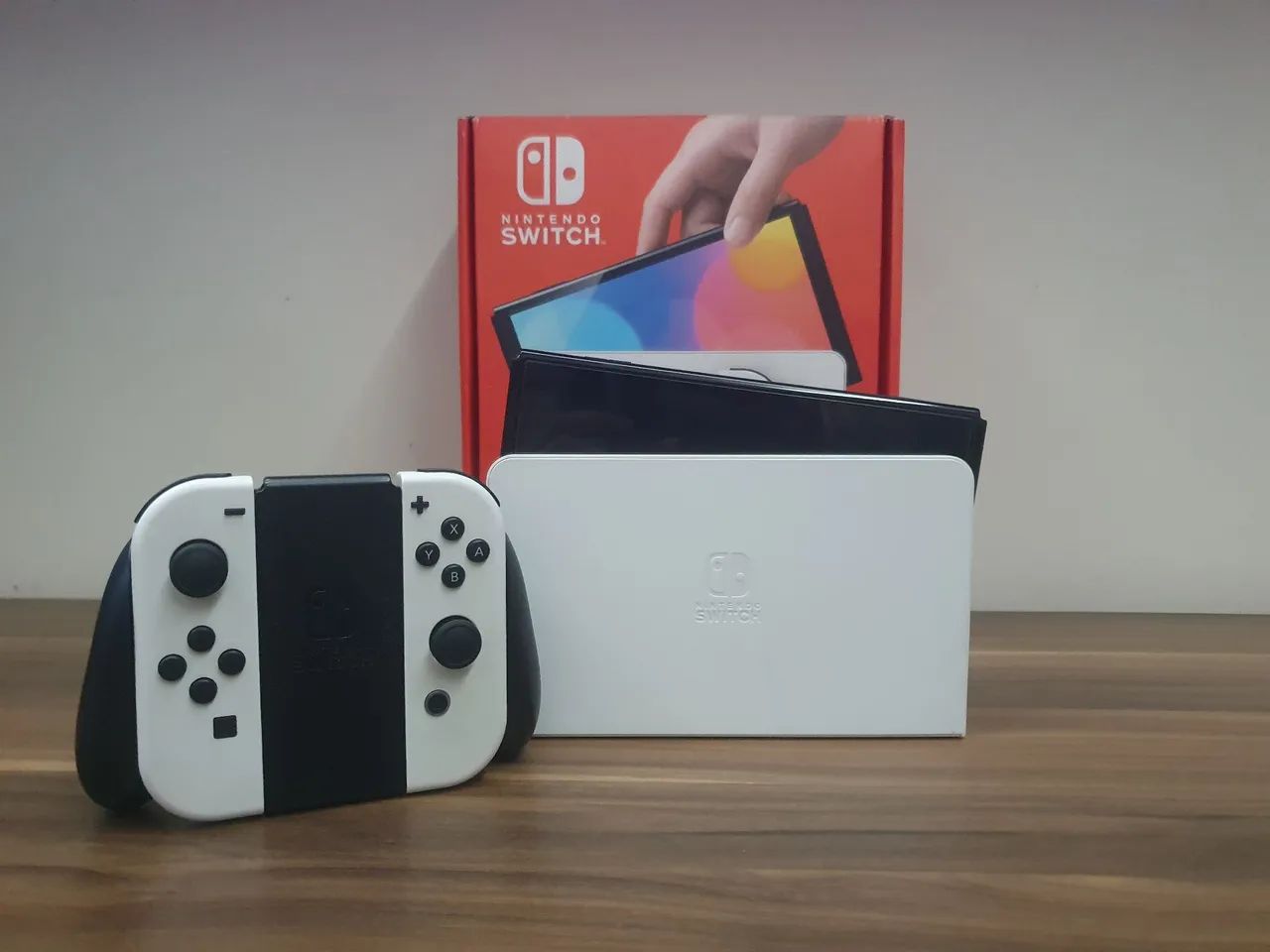 Nintendo switch OLED completo + 2 jogos físicos com conta digital - Foto 2