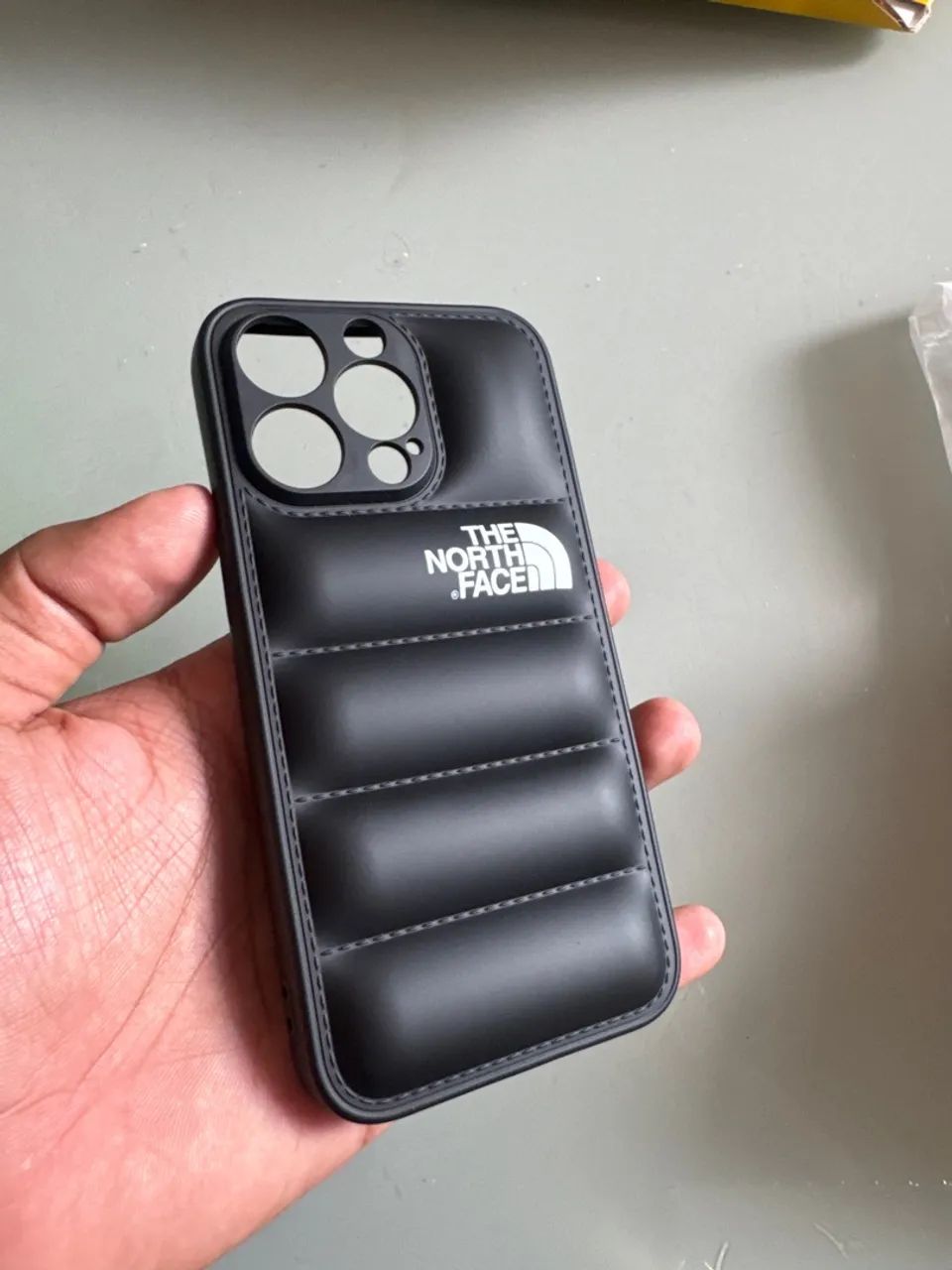 Capinha capa iphone the north face puffer 
