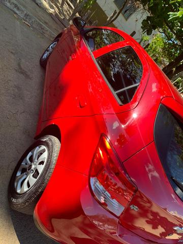 Vendo/troco/financio lindo onix 2014/ 1.0 completo - Foto 7