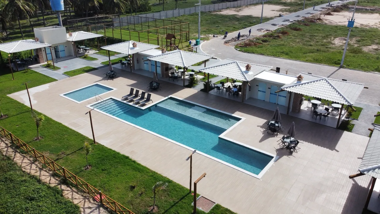 Vendo terreno 10x20 quitado no condomínio fechado Sunset Beach