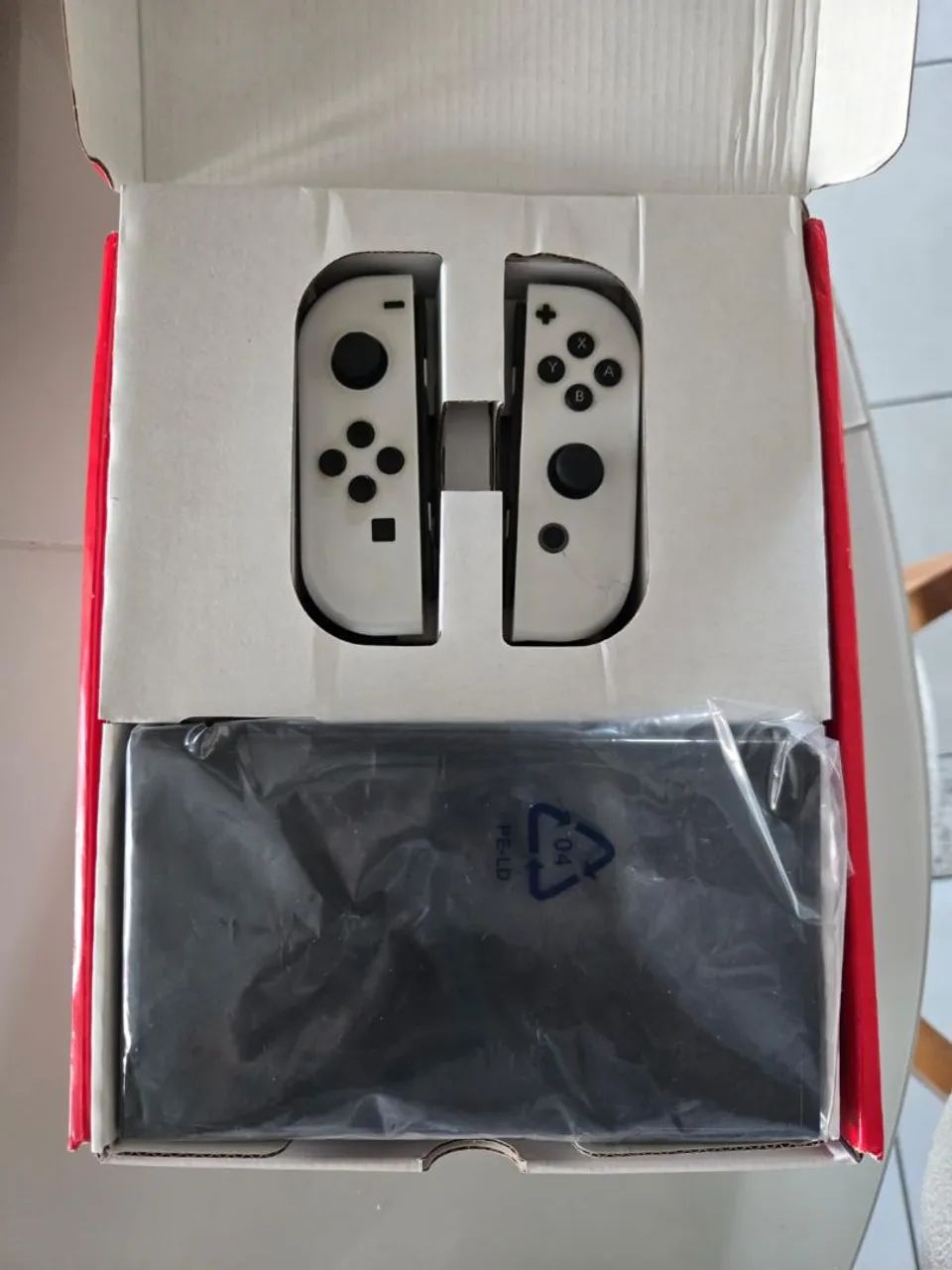 Nintendo switch com 2 jogos 2 pro controllers - Foto 3