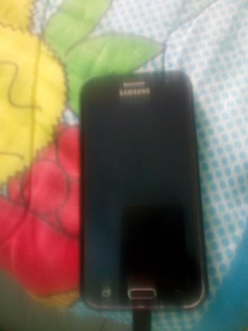 Vendo ou troco esse celular j2 funcionando tudo bom por um som ou um armário