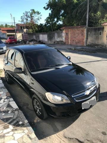 Celta 2014/2014 1.0 4p completo preto extra 49.000km 4pneus novos - Foto 8