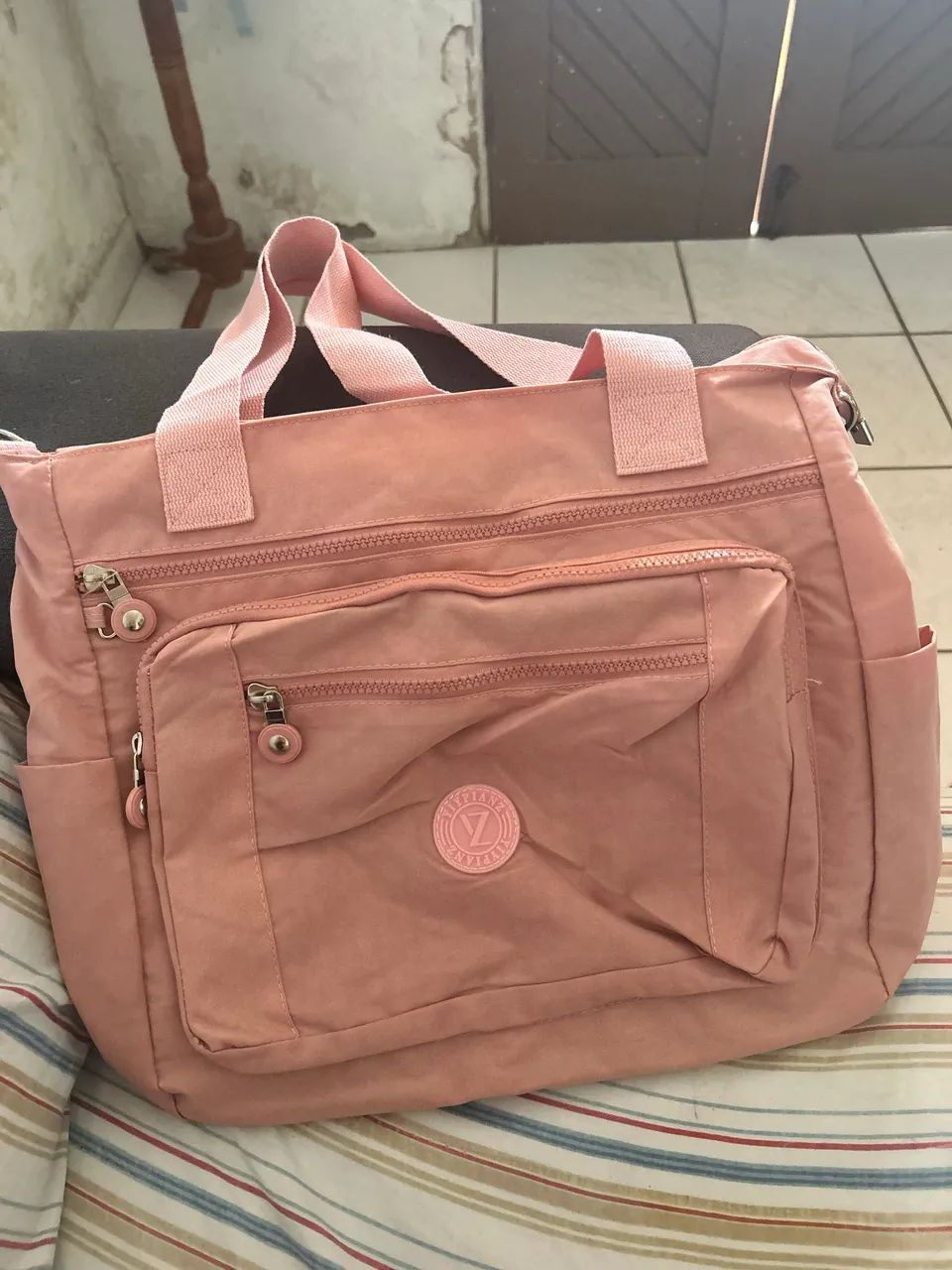 Bolsa de ombro e transversal rosa bebê 
