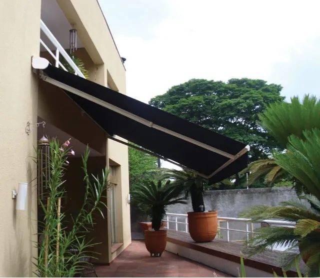 Toldo de braços retráteis