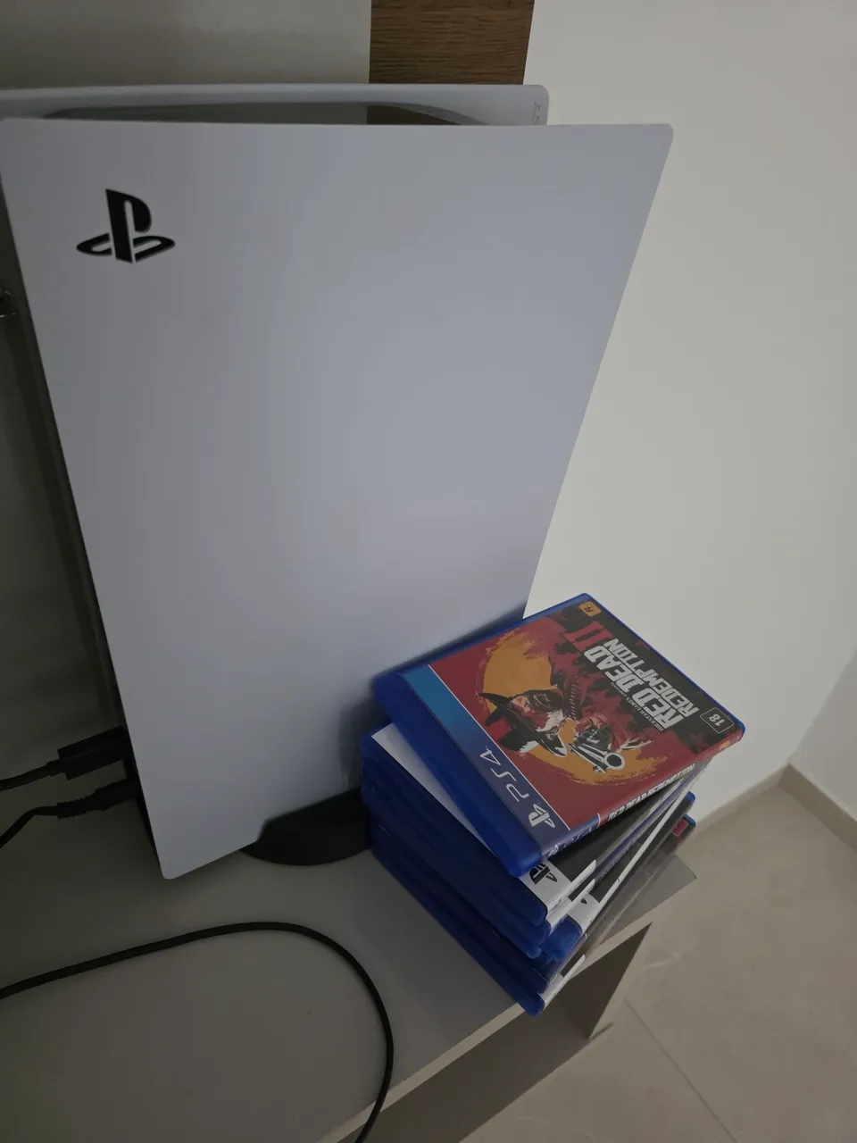 Playstation 5 + 8 jogos.