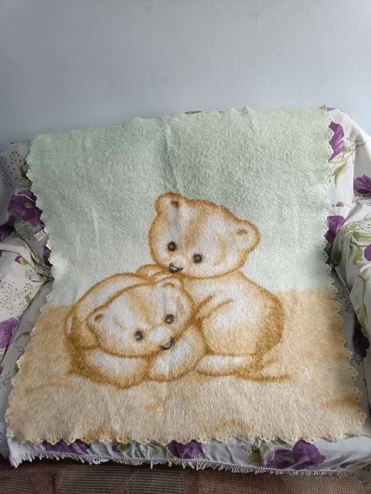 Cobertor com desenho do urso.64309620949123122