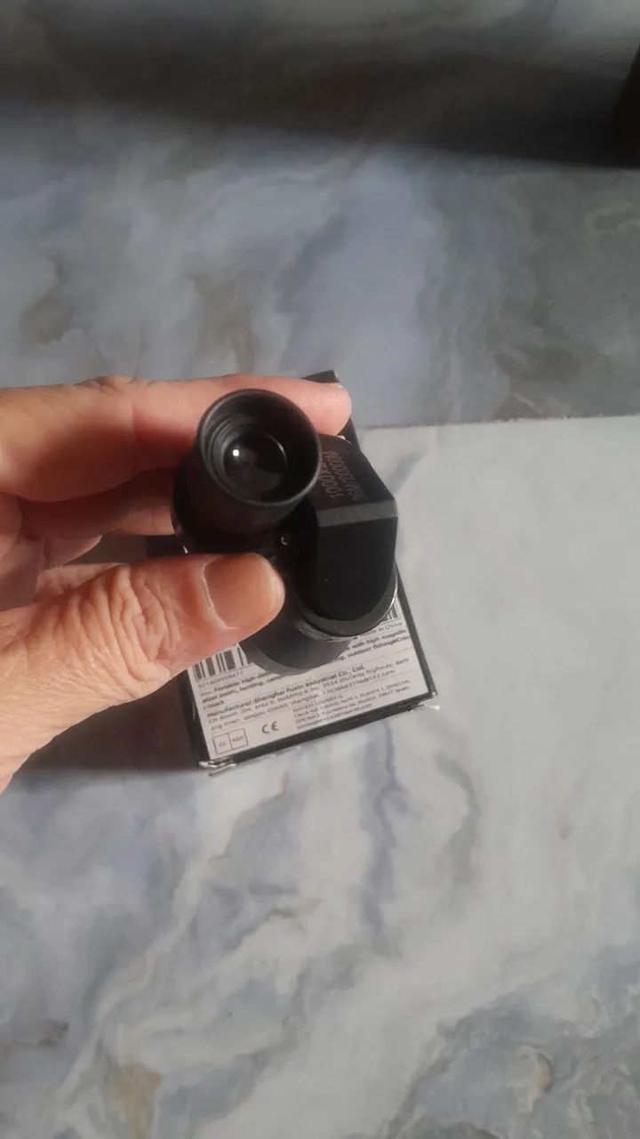 Microscópio monocular 
