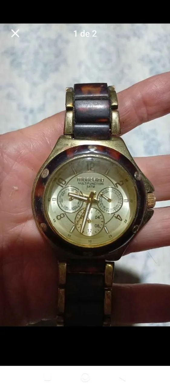 Relógio Mondaine com peças da pulseiraas a