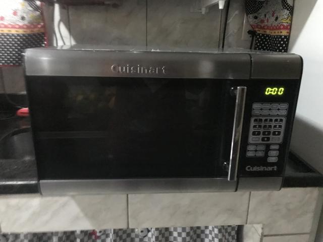 Top dos Microondass inox 31 litros todo no plástico ainda
