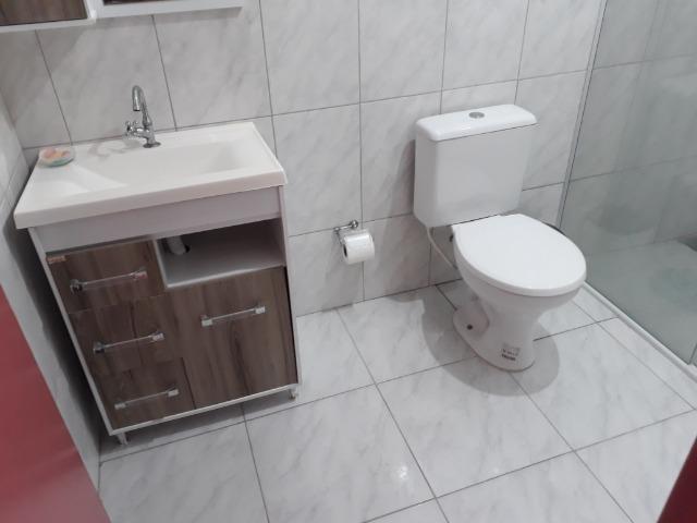 Vendo pequena casa de madeira na Pinheira - Foto 7