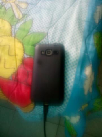 Vendo ou troco esse celular j2 funcionando tudo bom por um som ou um armário - Foto 3