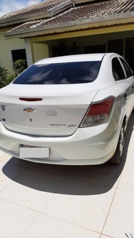 Prisma Joy 1.0 seminovo Branco Impecável carro de mulher - Foto 5