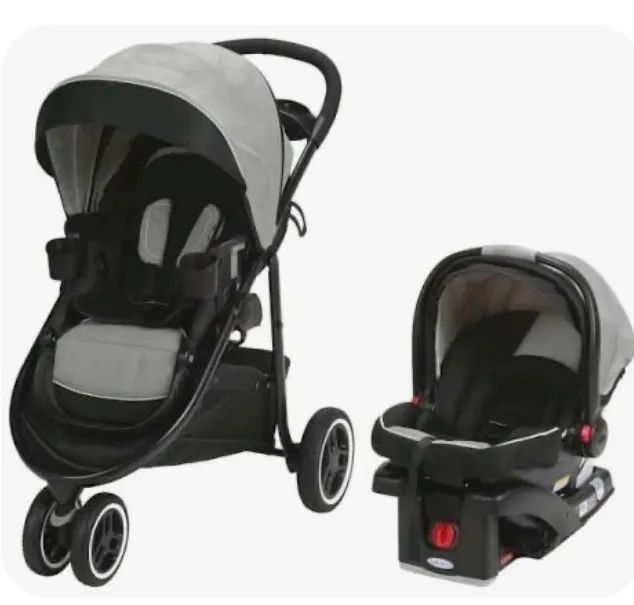 Carrinho de bebê com bebê Conforto Greco