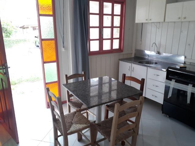 Vendo pequena casa de madeira na Pinheira - Foto 8
