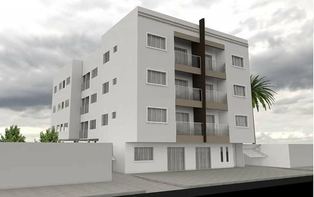 Alugo apartamento 2 quartos 1 vaga de garagem 63m centro