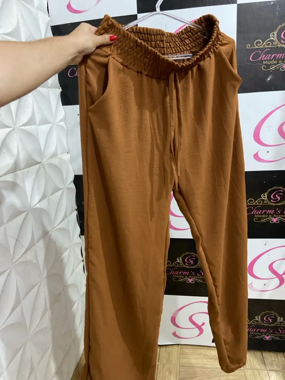 Calça duna com cintura alta e bolsos