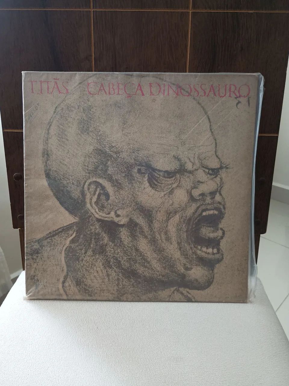 Disco de vinil titas cabeça dinossauro 