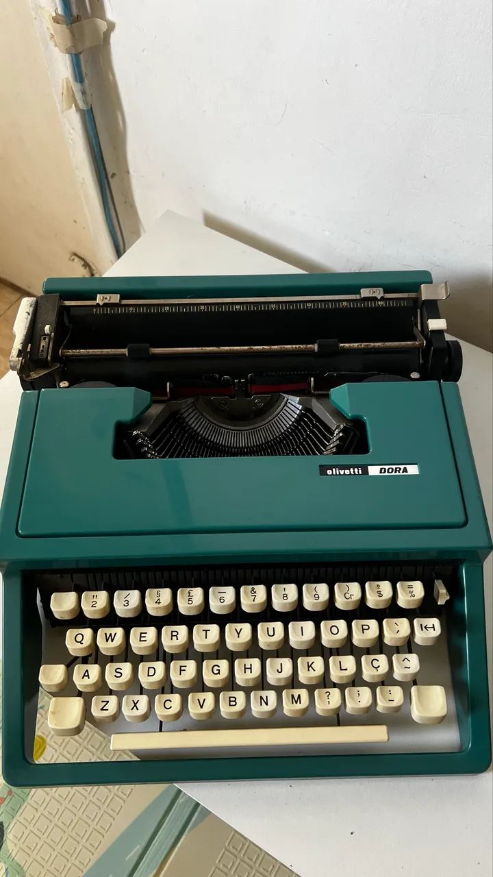 Máquina de escrever antiguidade Olivetti DORA - Foto 4