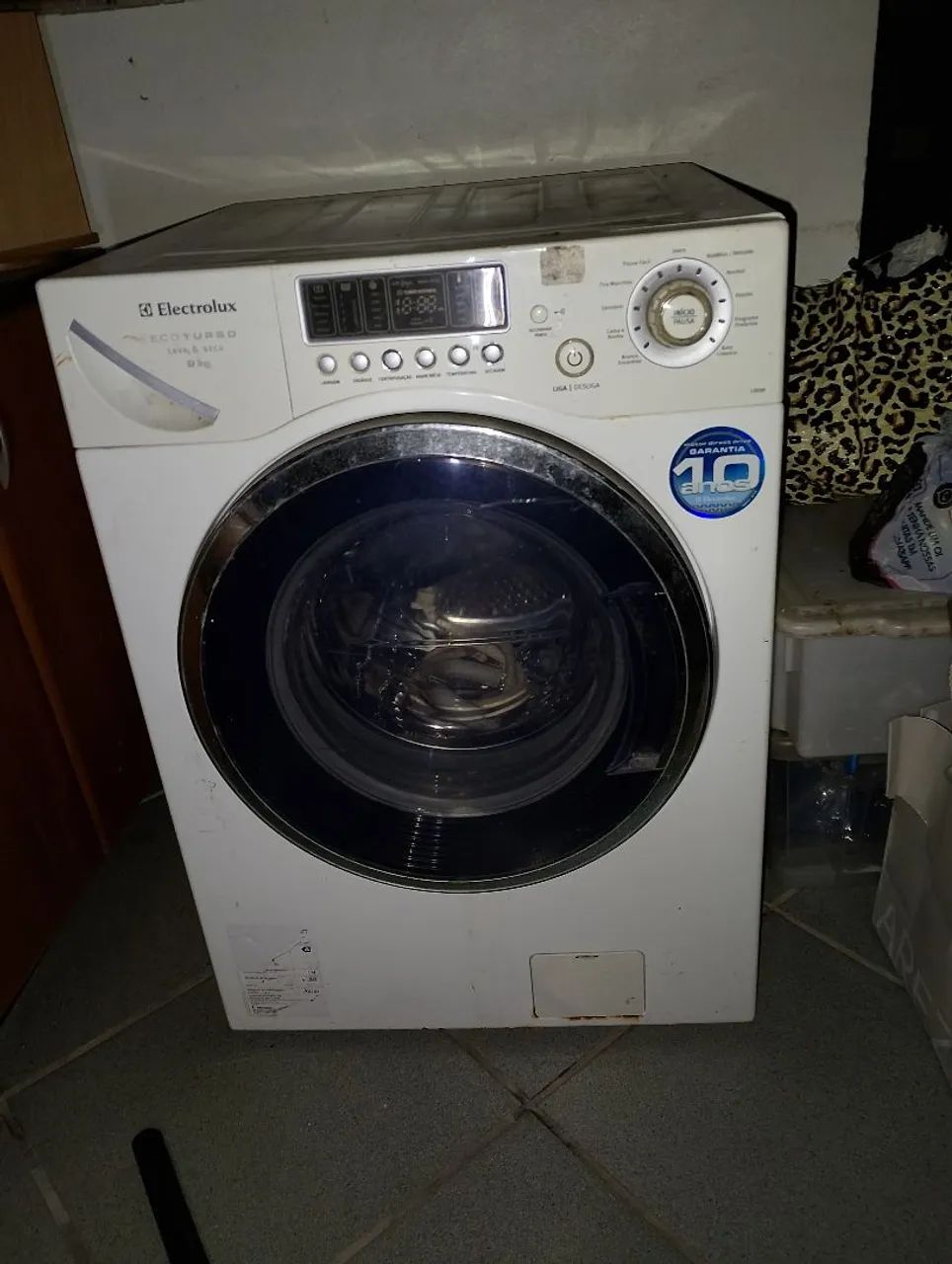 Máquina de lavar roupa lava e seca trocar a placa