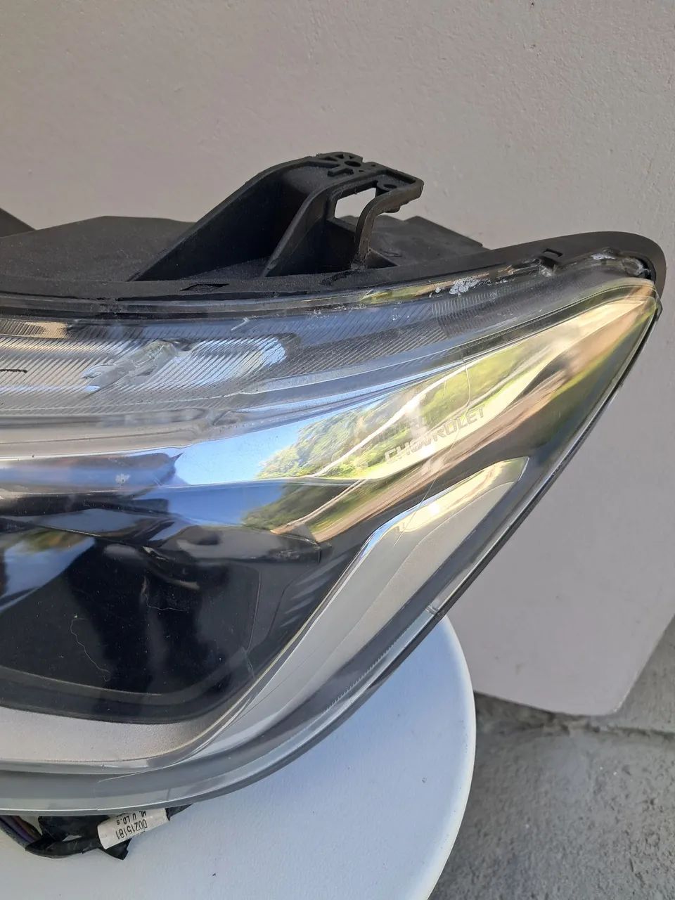 Farol esquerdo GM Chevrolet Tracker  - Foto 2