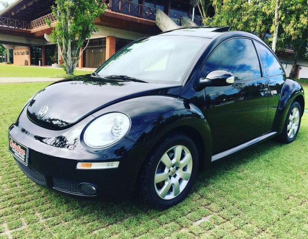 Vw - Volkswagen New Beetle