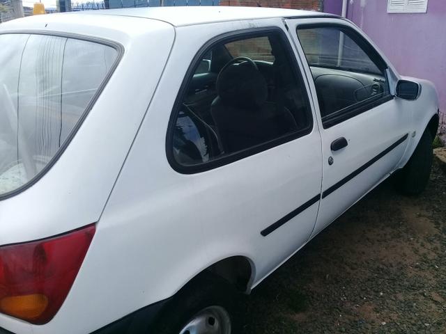 Vendo ou troco por carro já financiado - Foto 2
