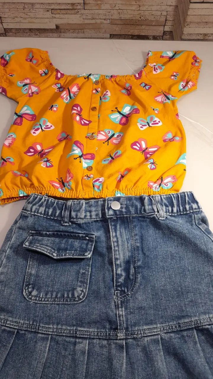 Vendo Conjunto Blusa Malwe kids e saia jeans seminovo T- 10 anos
