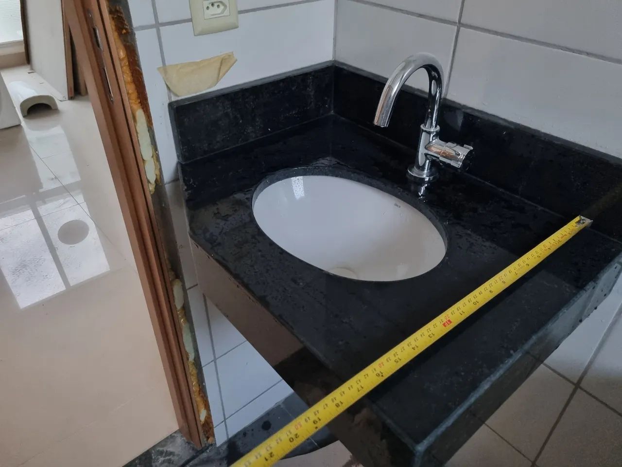 Granite countertop sink with porcelain basin, Docol faucet.64717753468547120