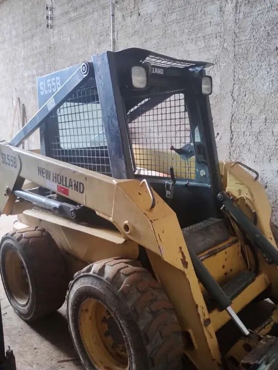 Bob cat New holland sl55b ano 2005  - Foto 4