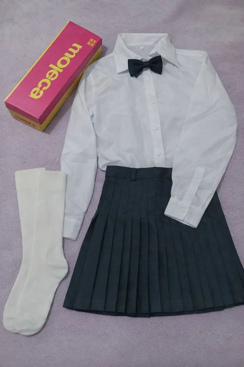 Uniforme Carmela Dutra