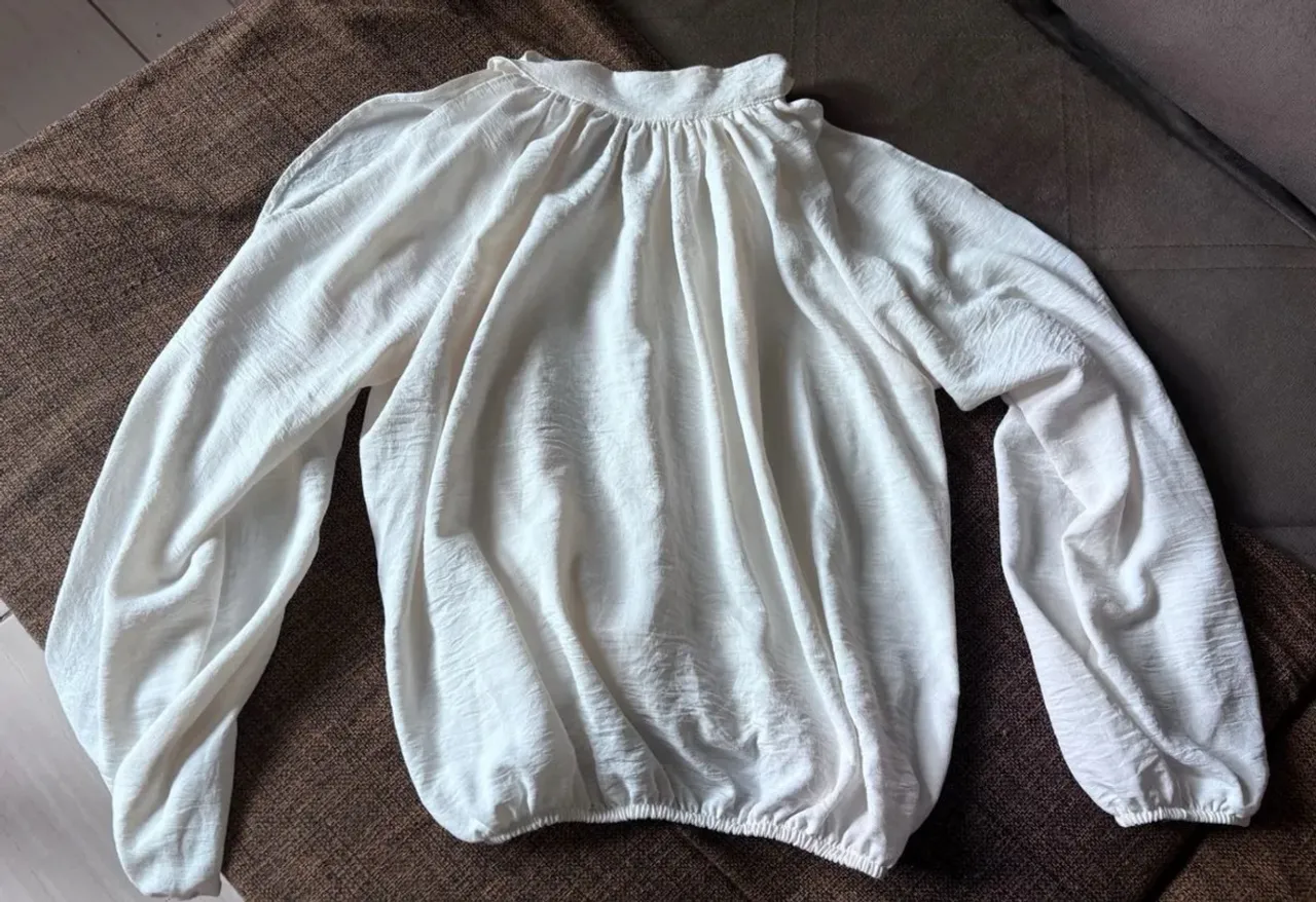 Blusa manga aberta